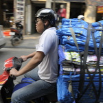 Transport de sacs... à vélomoteur